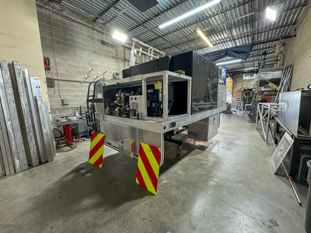 Open compartment interior during fabrication, photo 124 of 303.